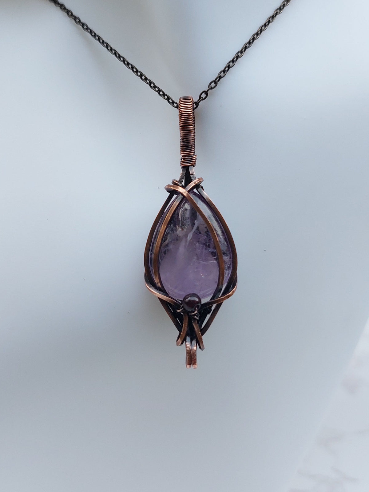 Amethyst Crossed Pendant with Garnet Bead