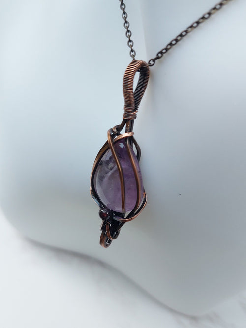 Amethyst Crossed Pendant with Garnet Bead